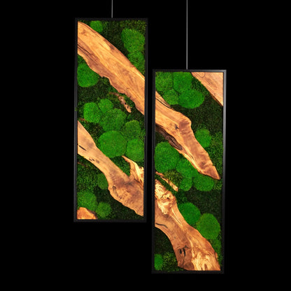 Zweiteiliges Moosbild „Olive Shift“ in schwarzen Rahmen - eine hochwertige Wanddekoration aus grünen Moosen und edlem Olivenholz für moderne Innenräume - Frontansicht.